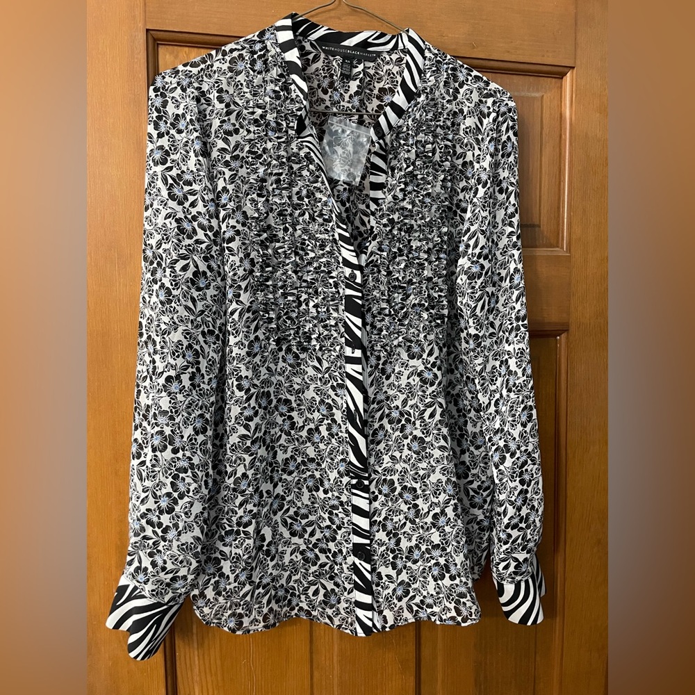 New stylish, sheer blouse. Great for work or pairs nicely with denim!